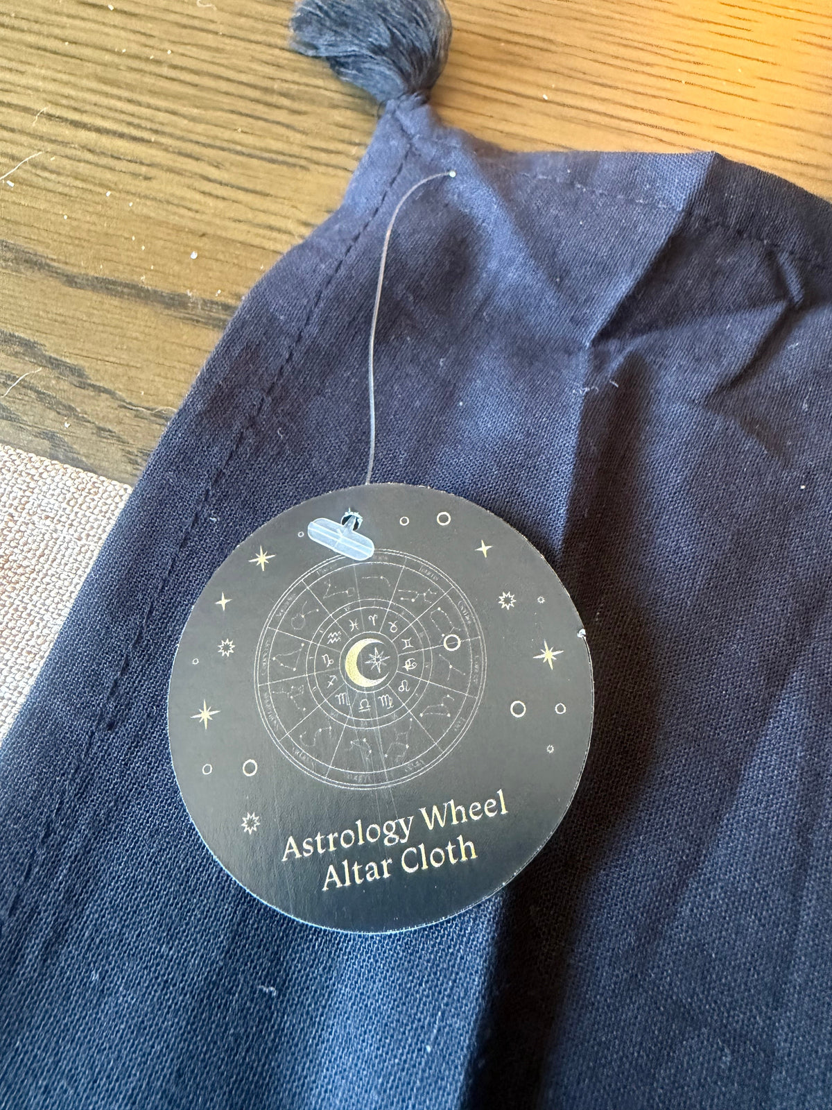 Astrology Wheel Altar Cloth product tag and drawstring pouch